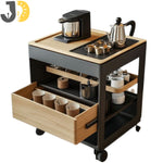 Load image into Gallery viewer, عربة قهوة أنيقة بتصميم خشبي معدني مع أدراج تخزين وعجلات، مثالية للمنازل والمكاتب الحديثة.
Modern wood and metal coffee cart with drawers and wheels — elegant, practical, and mobile.