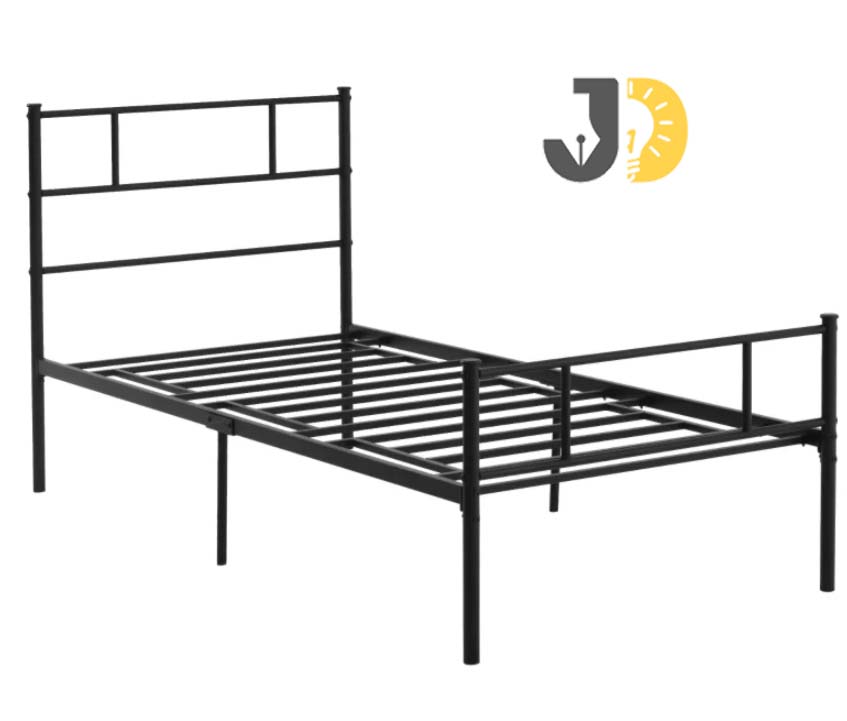 Black metal single bed frame with minimalist design in a modern bedroom